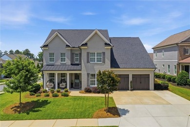 Welcome home to effortless living in one of South Forsyth's most - photo 2