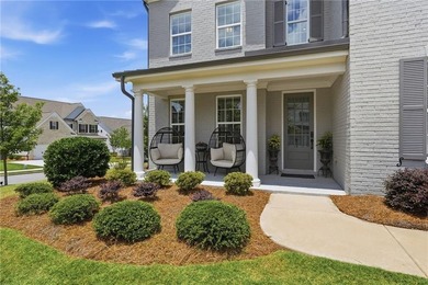 Welcome home to effortless living in one of South Forsyth's most - photo 3