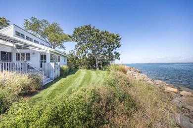 Set on an oversized bayfront parcel with sweeping views to - photo 1