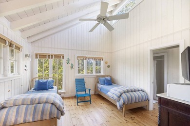 Set on an oversized bayfront parcel with sweeping views to - photo 9