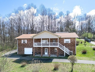 Spacious brick home tucked into a charming downtown Murphy - photo 3