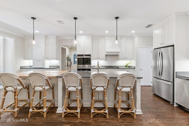 *Price adjusted for square footage correction* Nestled beneath a - photo 13