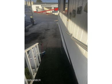 Ready to move in? This 2-bedroom 2-bath mobile home is waiting - photo 16
