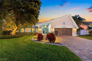 Set on the stunning Cape Coral riverfront, this extensively - photo 2