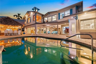 Set on the stunning Cape Coral riverfront, this extensively - photo 3