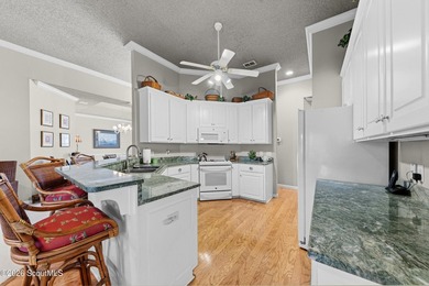 This charming 3-bedroom, 2-bath custom-built home by WH Gross - photo 3