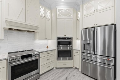 Marshfront Retreat in gated Fiddler's Cove, this home offers - photo 14