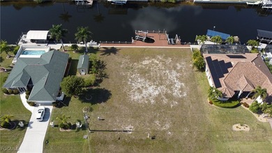 Rare Triple Gulf Access Lot with Seawall, Dock & Lift - Ready to - photo 2