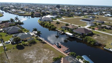 Rare Triple Gulf Access Lot with Seawall, Dock & Lift - Ready to - photo 4