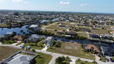 Rare Triple Gulf Access Lot with Seawall, Dock & Lift - Ready to - photo 5