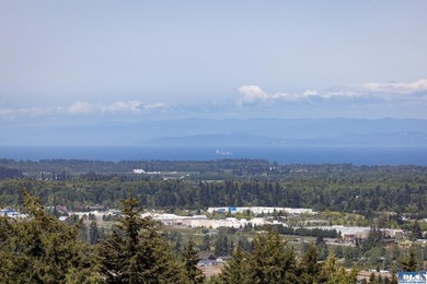 Prime one-acre lot in Sequim with stunning water views - photo 8