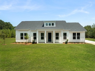 The Fischer plan offers easy main-level living with Lowcountry - photo 2