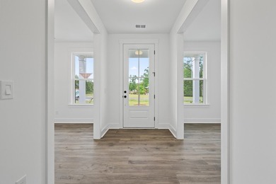 The Fischer plan offers easy main-level living with Lowcountry - photo 4