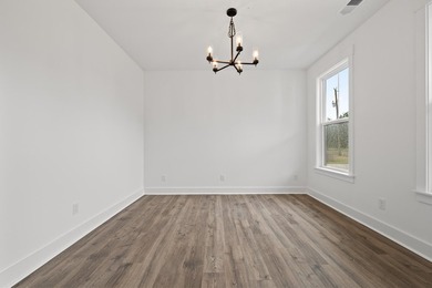 The Fischer plan offers easy main-level living with Lowcountry - photo 6