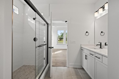 The Fischer plan offers easy main-level living with Lowcountry - photo 8