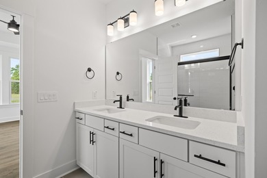 The Fischer plan offers easy main-level living with Lowcountry - photo 9
