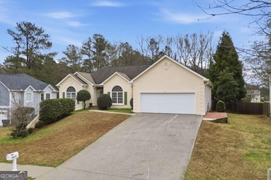 Fantastic Opportunity! This ranch home sits on just under half