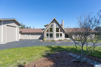 Beautifully appointed and thoughtfully upgraded, this Northwest - photo 1