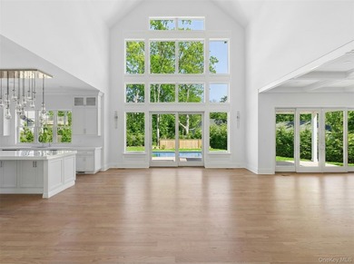 This stunning new construction estate, South of the Highway in - photo 2