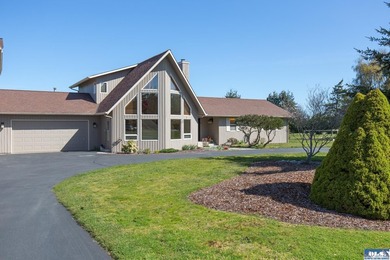 Beautifully appointed and thoughtfully upgraded, this Northwest - photo 8