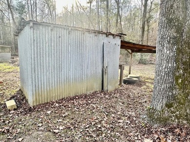 Situated on approximately 0.9 acres, this 1985 18x80 single-wide - photo 23