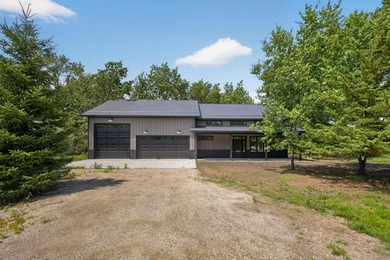 Custom built barndominium in Prairie Sands offering refined - photo 30