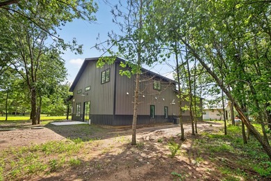Custom built barndominium in Prairie Sands offering refined - photo 31