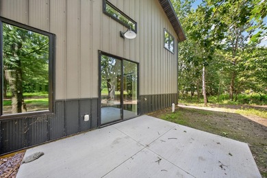 Custom built barndominium in Prairie Sands offering refined - photo 33