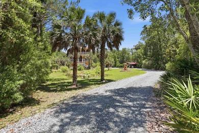 Tucked behind a private gate on nearly 14.5 acres, 45 St. Marks - photo 3