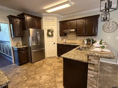 Charming 1998 Brick Home with Spacious Living and Modern - photo 4
