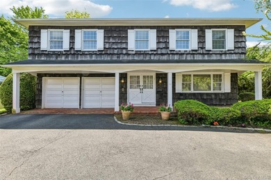 Large Center Hall Colonial in a prime Lawrence location. Set on - photo 1