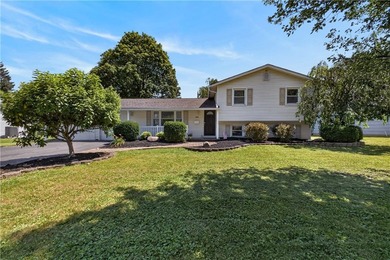 Welcome to this spacious 1672 sq. ft. split level home in a - photo 1