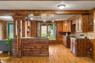 Beautiful 3-bedroom, 2-bath log home offering 1,860 square feet - photo 11