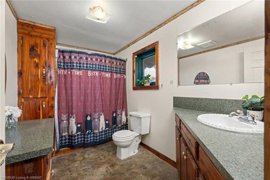 Beautiful 3-bedroom, 2-bath log home offering 1,860 square feet - photo 20
