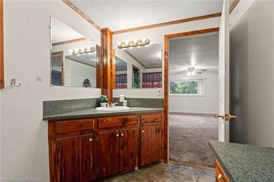 Beautiful 3-bedroom, 2-bath log home offering 1,860 square feet - photo 21
