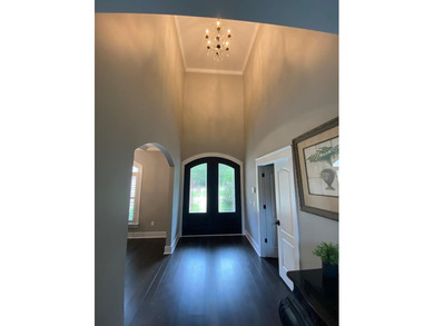 French Country Two-Story Brick Home! Located in the Rehobeth