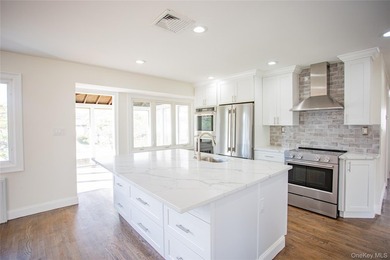Welcome to this masterfully renovated High Ranch, offering the - photo 4