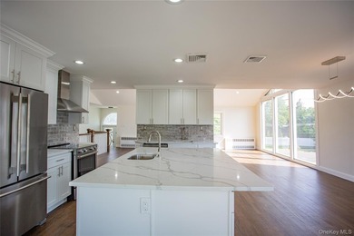Welcome to this masterfully renovated High Ranch, offering the - photo 5