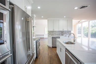 Welcome to this masterfully renovated High Ranch, offering the - photo 7