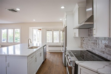 Welcome to this masterfully renovated High Ranch, offering the - photo 10