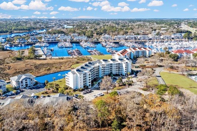 Enjoy sweeping marina, lighthouse, and Intracoastal Waterway