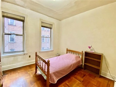 Spacious and bright apartment featuring hardwood floors and high - photo 8
