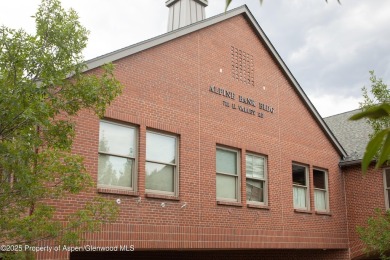 Own the light and bright end-unit of this well known office