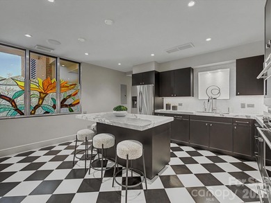 Elegant and gracious living in a tranquil 15+ acre lush garden