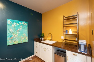 Own the light and bright end-unit of this well known office