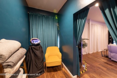 Own the light and bright end-unit of this well known office