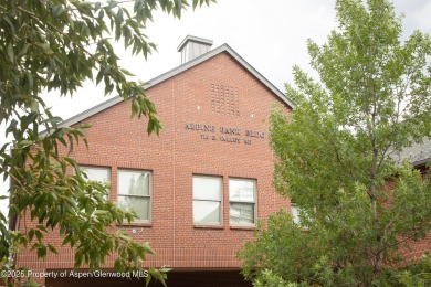 Own the light and bright end-unit of this well known office