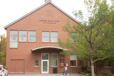 Own the light and bright end-unit of this well known office