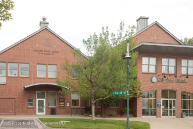 Own the light and bright end-unit of this well known office