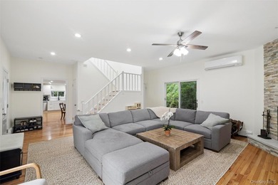 Nestled on a private and picturesque .88-acre property, this - photo 2